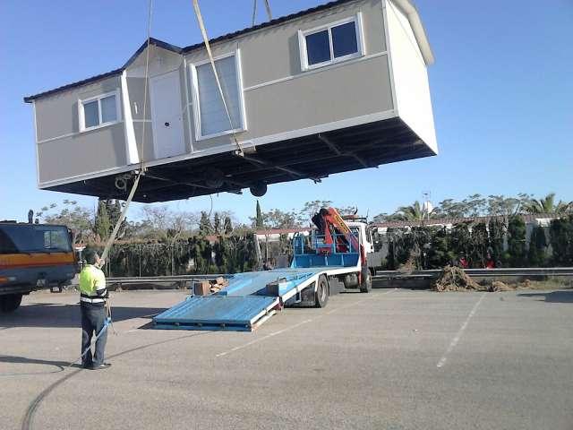 Manufacturing prefab houses using SHERA Plank for the siding