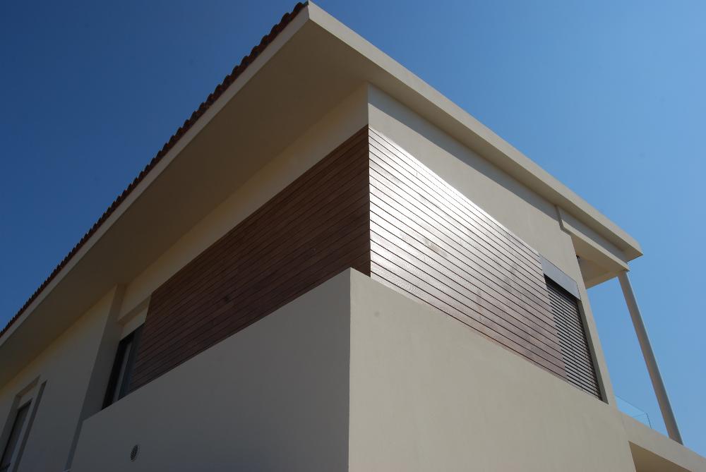 Exterior wall construction using fibre cement boards