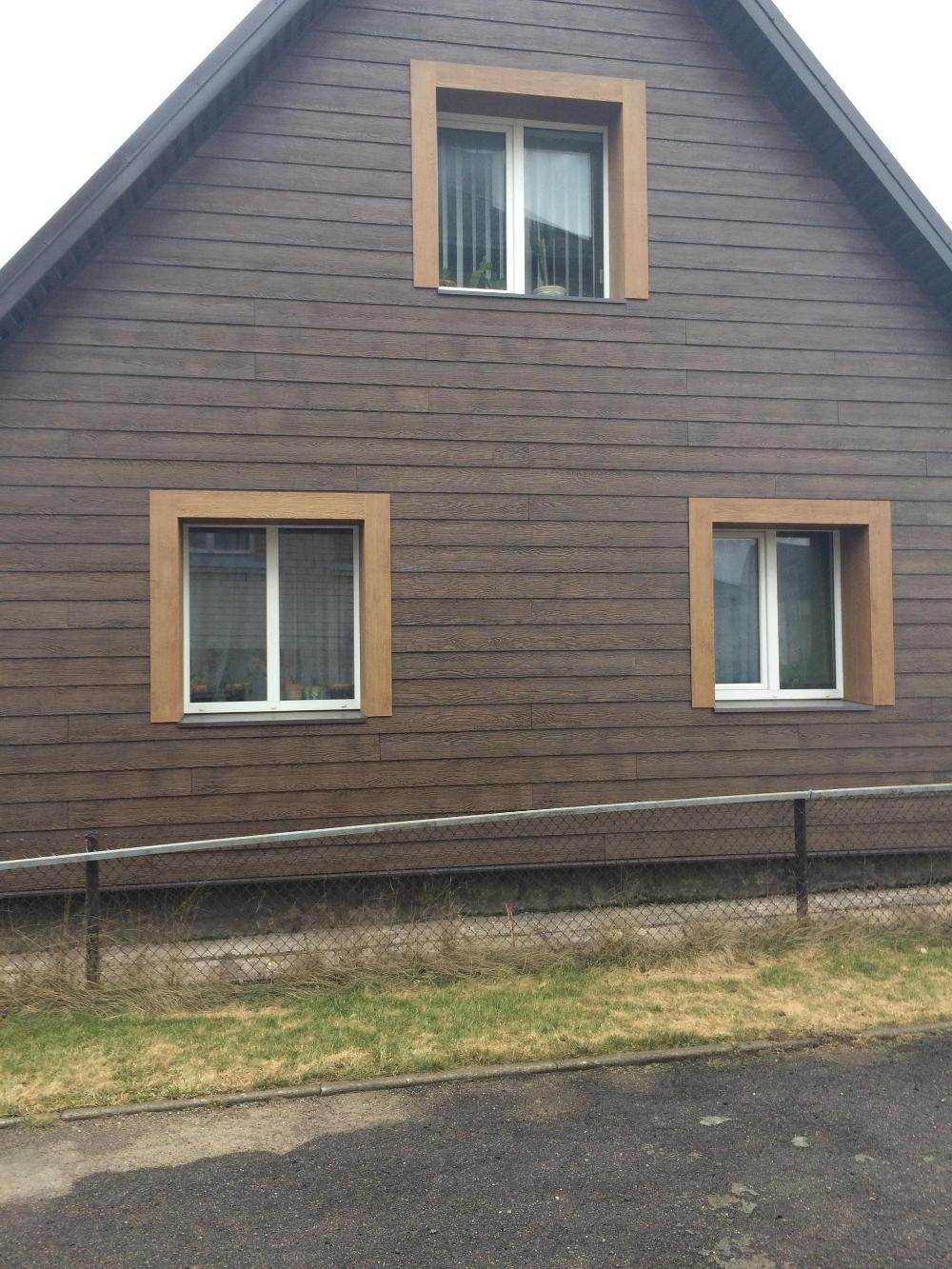 Exterior siding on a house in Lithuania using SHERA fibre cement plank