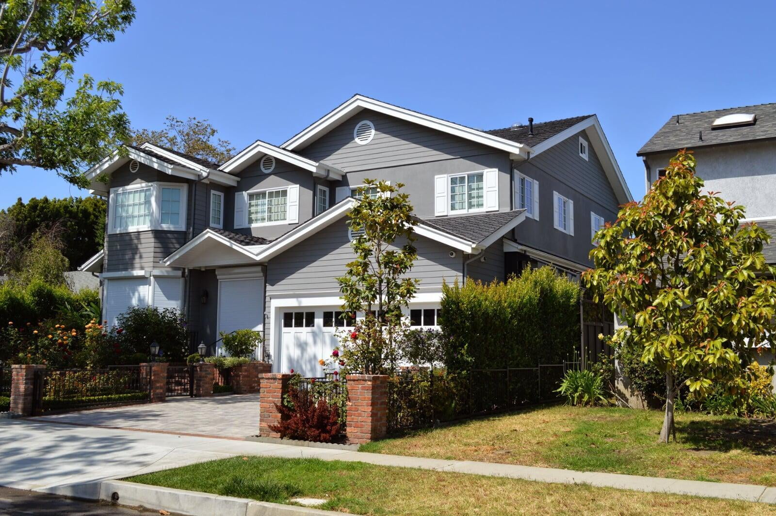 SHERA fibre cement plank in modern grey colour used on an exterior house siding application