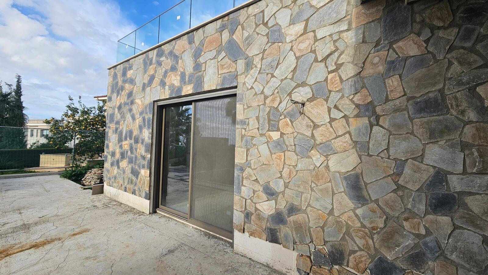SHERA fibre cement board is the perfect material as a backer board for stone or masonry cladding